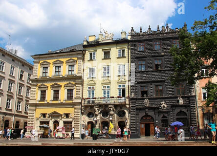 LVIV, UKRAINE - JUNE 13, 2015: Market (Rynok) square of Lviv - the central square and most popular touristic place in historical part of town Stock Photo