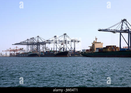 Container vessels from United Arab Shipping Company (UASC) and NYK Line docked at the Oman International Container Terminal in Sohar, Oman, on 9 Augus Stock Photo