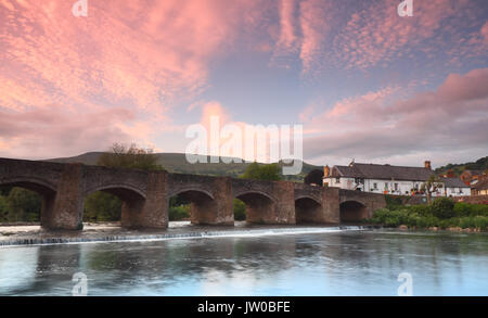 Crickhowell Bridge spanning the River Usk on the edge of historic Crickhowell town on a beautiful evening, Crickhowell, Powys, Wales, UK Stock Photo