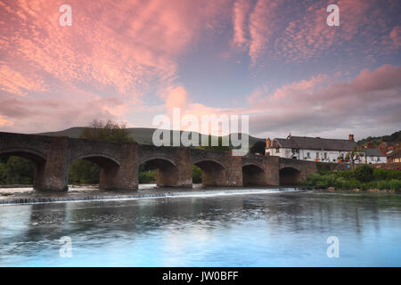 Crickhowell Bridge spanning the River Usk on the edge of historic Crickhowell town on a beautiful evening, Crickhowell, Powys, Wales, UK Stock Photo