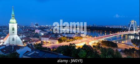 Panoramic view of Bratislava city with St. Martin's Cathedral and Danube river at night Stock Photo