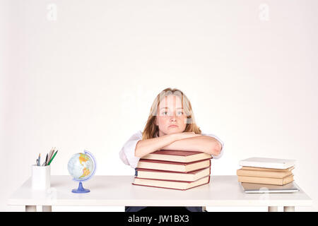 Girl studying at desk Stock Photo