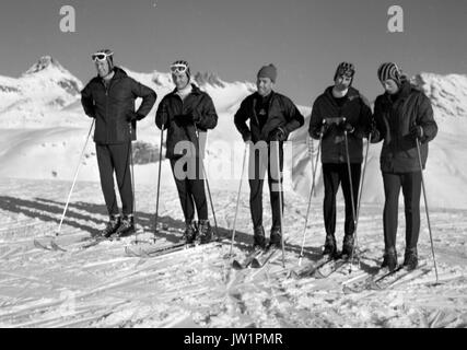 The Duke of Kent, the captain, with members of his regimental team from the Royal Scots Greys, on the Corviglia slope at St Moritz. The team are competing in the Army Ski Championships (l-r) Lieutenant Gray, Second-Lieutenant Franckstein, the unidentified team's Swiss coach, Captain Trotter and Prince Edward, Duke of Kent. Stock Photo