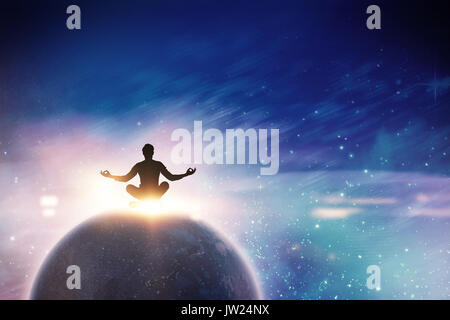 Zen businessman meditating in yoga pose against digitally composite image of colorful lights  Zen businessman meditating in yoga pose on white backgro Stock Photo