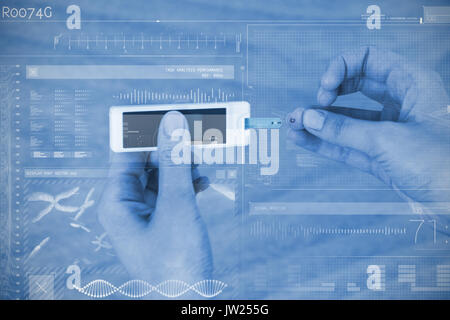 Data science against close up of woman testing blood sugar with glucometer Stock Photo