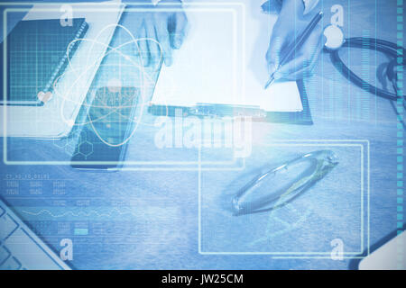 Atom and DNA helix interface against cropped hands of doctor writing prescription on clipboard at desk Stock Photo