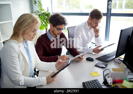 business team with tablet pc at office Stock Photo