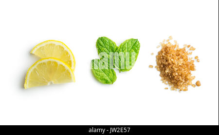Mojito ingredients. Lemon, mint and cane sugar isolated on white background. Sweet sugar, mint leaves and lemon. Stock Photo