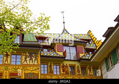 Beautiful painted facade with window shutters in the old town of Lucerne, Switzerland Stock Photo