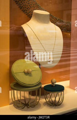 Cartier window on Fifth Avenue displays a jeweled woman's necklace Stock Photo