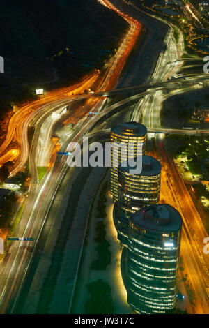 Motorways, Mapocho River, and office blocks viewed at night from Sky Costanera skyscraper, Santiago, Chile, South America Stock Photo