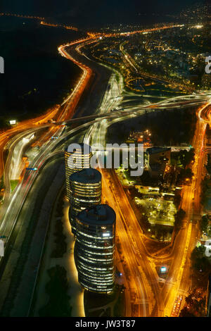 Motorways, Mapocho River, and office blocks viewed at night from Sky Costanera skyscraper, Santiago, Chile, South America Stock Photo