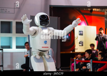 TOKYO, JAPAN - NOVEMBER 27 2015: Asimo, the humanoid robot created by Honda is presented at Miraikan, The National Museum of Emerging Science and Inno Stock Photo
