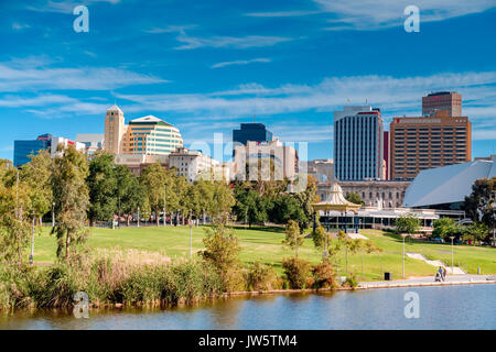 Adelaide, Australia - December 2, 2016: Adelaide city skyline on a day viewed through Torrens river in Elder Park on a bright day Stock Photo