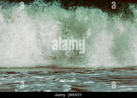 Breaking wave abstracted in post-processing. Stock Photo
