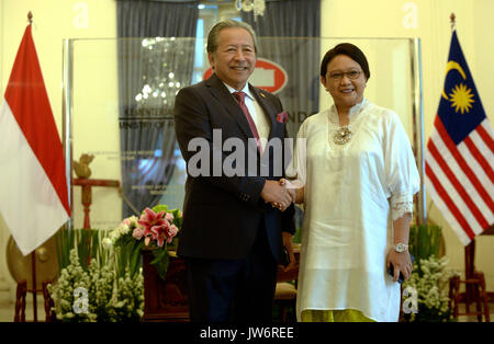 Jakarta. 11th Aug, 2017. Indonesian Foreign Minister Retno Marsudi (R) meets with visiting Malaysian Foreign Minister Anifah Aman in Jakarta Aug. 11, 2017. Credit: Agung Kuncahya B./Xinhua/Alamy Live News Stock Photo