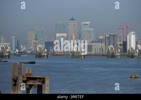 London, UK. 11th Aug, 2017. Blue sky over Canary Wharf with light cloud. :Credit: Claire Doherty Alamy/Live News Stock Photo