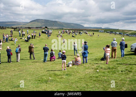The fell race winner crosses the line to audience applause at the annual Appleby Show, Cumbria, UK, 10th August 2017. The runners race over Murton Pike. Stock Photo