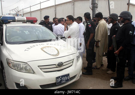 Pakistan. 11th August, 2017. View of venue after target killing of DSP traffic Hanif Khan, in Azizabad area of Karachi on Friday, August 11, 2017. DSP traffic Hanif Khan and his gunman Fida Alam were killed in an incident of target killing in Azizabad area of Karachi on Friday. According to police sources, the DSP and his gunman were in their vehicle when unidentified assailants opened fire at them. Credit: Asianet-Pakistan/Alamy Live News Stock Photo