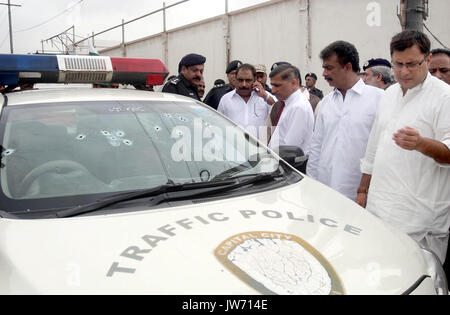 Pakistan. 11th August, 2017. View of venue after target killing of DSP traffic Hanif Khan, in Azizabad area of Karachi on Friday, August 11, 2017. DSP traffic Hanif Khan and his gunman Fida Alam were killed in an incident of target killing in Azizabad area of Karachi on Friday. According to police sources, the DSP and his gunman were in their vehicle when unidentified assailants opened fire at them. Credit: Asianet-Pakistan/Alamy Live News Stock Photo