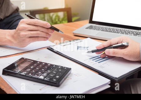 Business meeting  in outdoor. documents account managers crew working with new startup project Idea presentation, analyse marketing plans. Stock Photo