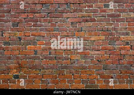Rundown red brick wall Stock Photo