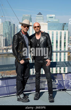 Matt (left) and Luke Goss of boy band Bros pose on top of the O2 Arena in London ahead of their comeback tour, which will see them play two gigs at the venue later this month. Stock Photo