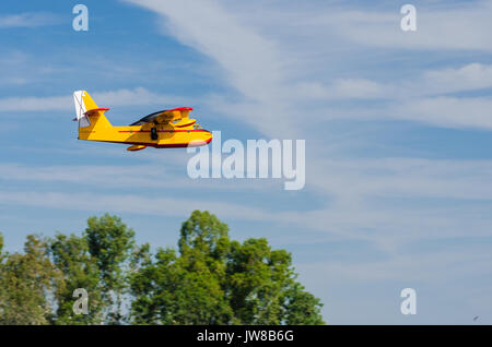 Radio controlled model hydroplane  flying on a nice cloudy day over Badajoz, Extremadura, Spain Stock Photo