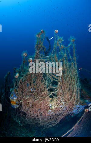 Derelict fishing net in Hermanos Florin shipwreck in Ses Salines Natural Park (Formentera, Balearic Islands, Mediterranean sea, Spain) Stock Photo