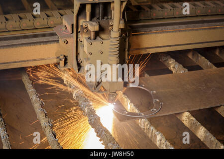 CNC plasma cutting machine during operation. Stock Photo