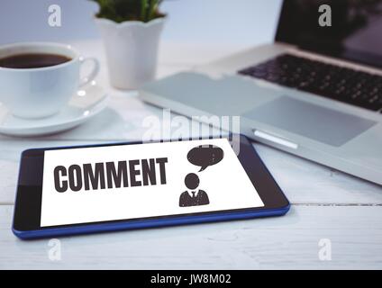 Digital composite of Comment text and chat graphic on tablet screen Stock Photo