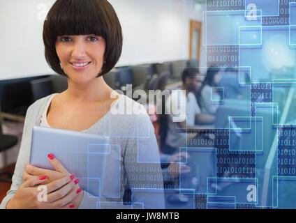 Digital composite of University teacher with class in computer room Stock Photo