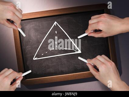 Digital composite of Hands drawing pyramid on blackboard Stock Photo