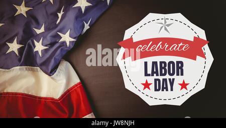 Digital composite of Labor day text over US flag Stock Photo