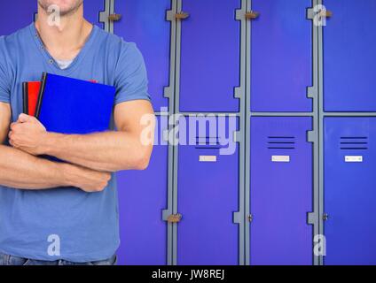 Digital composite of male student holding books in front of lockers Stock Photo