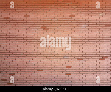red smooth brick wall texture with dark colored bricks Stock Photo