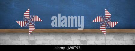 Digital composite of USA wind catchers in front of blackboard Stock Photo