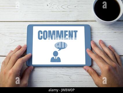 Digital composite of Comment text and chat graphic on tablet screen with hands Stock Photo