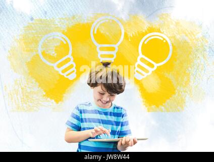 Digital composite of Boy on tablet under light bulbs Stock Photo