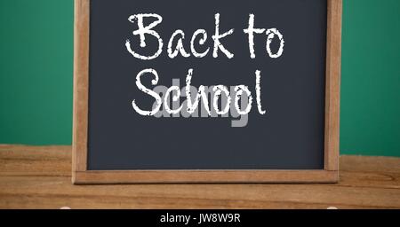 Digital composite of back to school text on blackboard Stock Photo