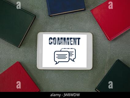 Digital composite of Comment text and chat graphic on tablet screen with books Stock Photo