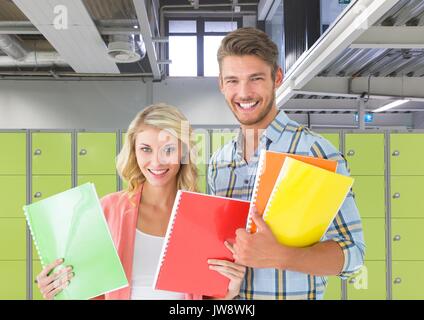 Digital composite of Students holding foldersmale student holding book in front of lockers Stock Photo