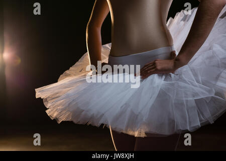 Ballerina practicing ballet dance in the studio Stock Photo