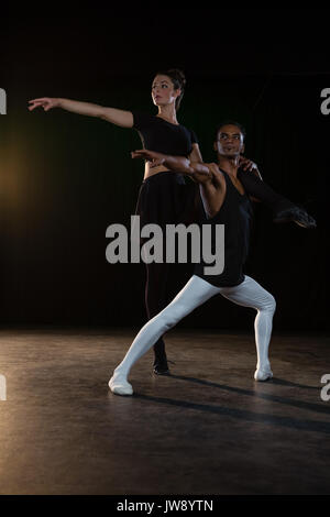 Ballet partners practicing ballet dance in stage Stock Photo - Alamy