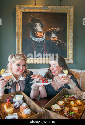 Kyloe launches National Afternoon Tea Week with Gilded Balloon act, 'Mothers Ruin: A Cabaret About Gin’, savouring Kyloe's take on the traditional. Stock Photo