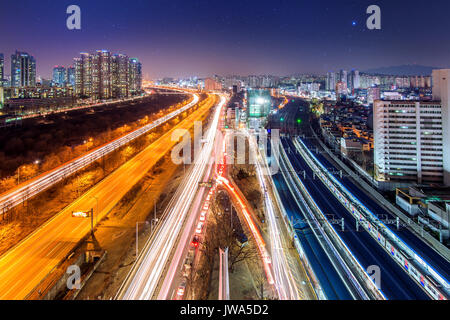 Traffic in Singil district, Seoul Korea skyline at night. Stock Photo