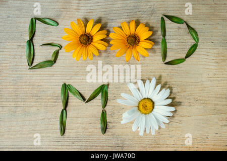 Inscription good morning, laid out out of wildflowers on a wooden background Stock Photo