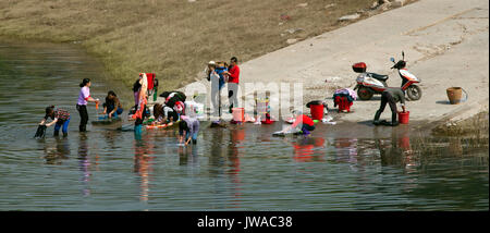 Women Washing Clothes In The Yangtze River, Yichang, Hubel Province ...