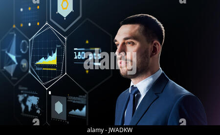 businessman with virtual screen over black Stock Photo
