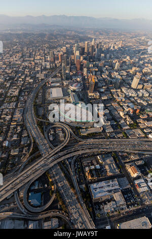 Los Angeles, California, USA - August 7, 2017:  Smoggy afternoon aerial view of downtown Los Angeles freeways in Southern California. Stock Photo